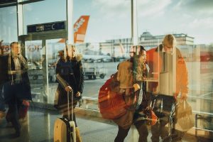 people at Midway airport getting off plane