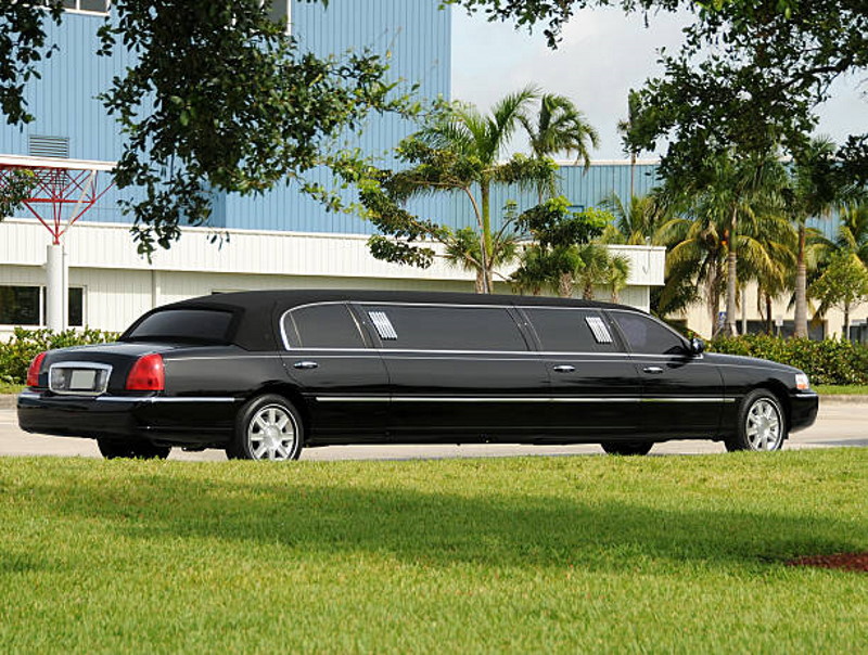 black limousine on the road for spring break