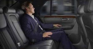 Person seated in the backseat of a luxury Corporate Limo Service Chicago